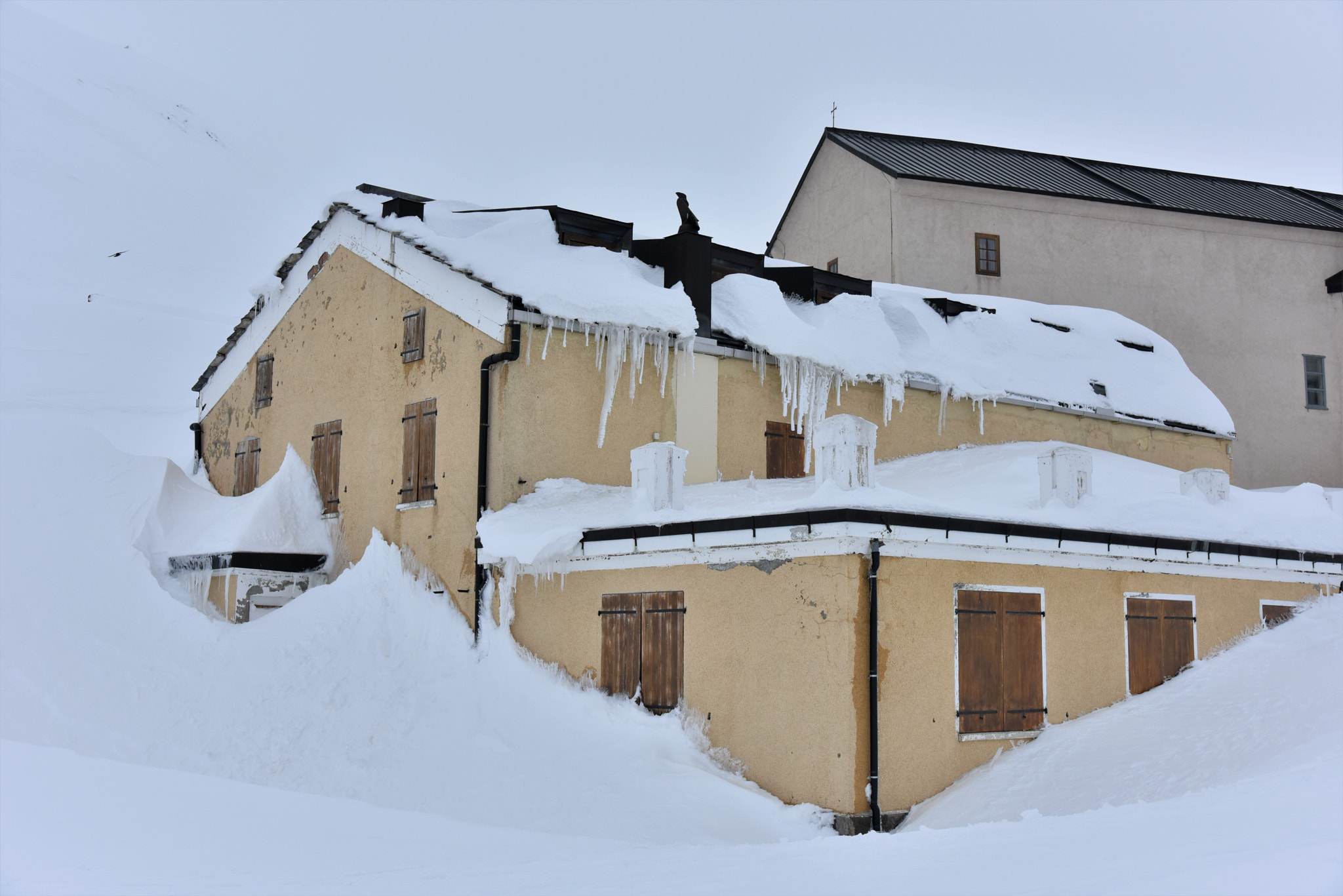 Nikon AF-S Nikkor 24-120mm F4G ED VR sample photo. Great st bernard hospice, snow covered photography