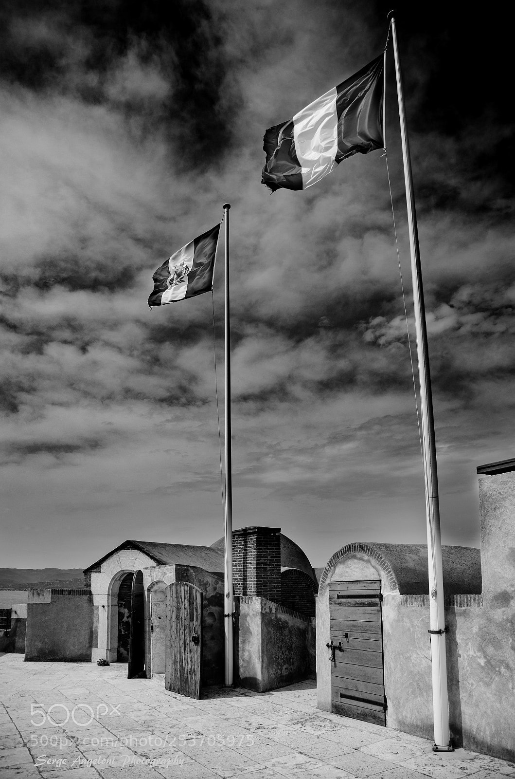 Canon EOS 5D Mark II sample photo. Flags in the win photography