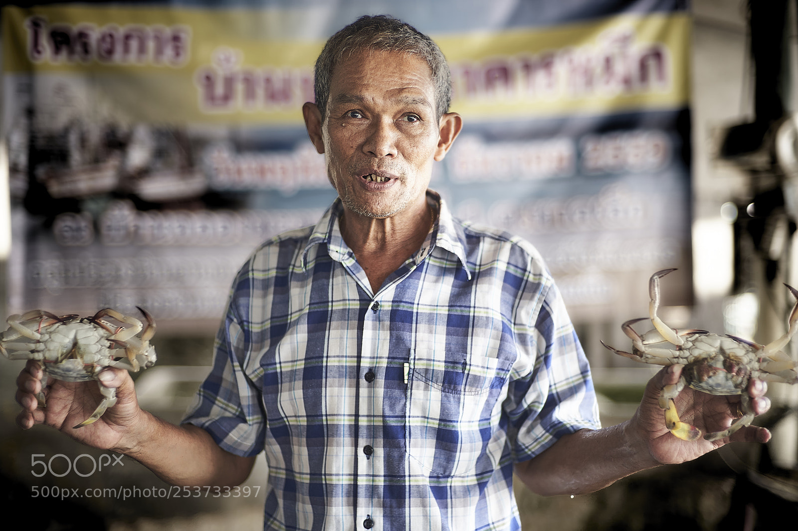 Sony a7 III sample photo. Artisan fisherman holding crabs photography