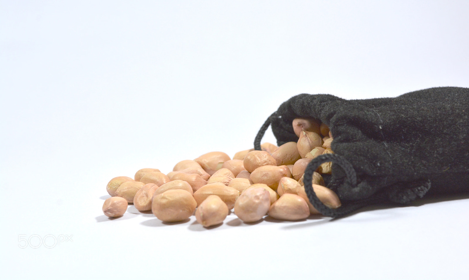Nikon D5200 sample photo. Peanuts in burlap bag photography