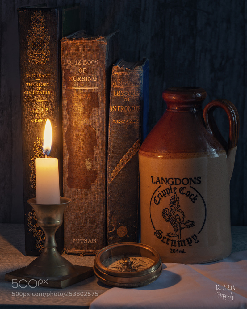 Nikon D5200 sample photo. Candle& books photography