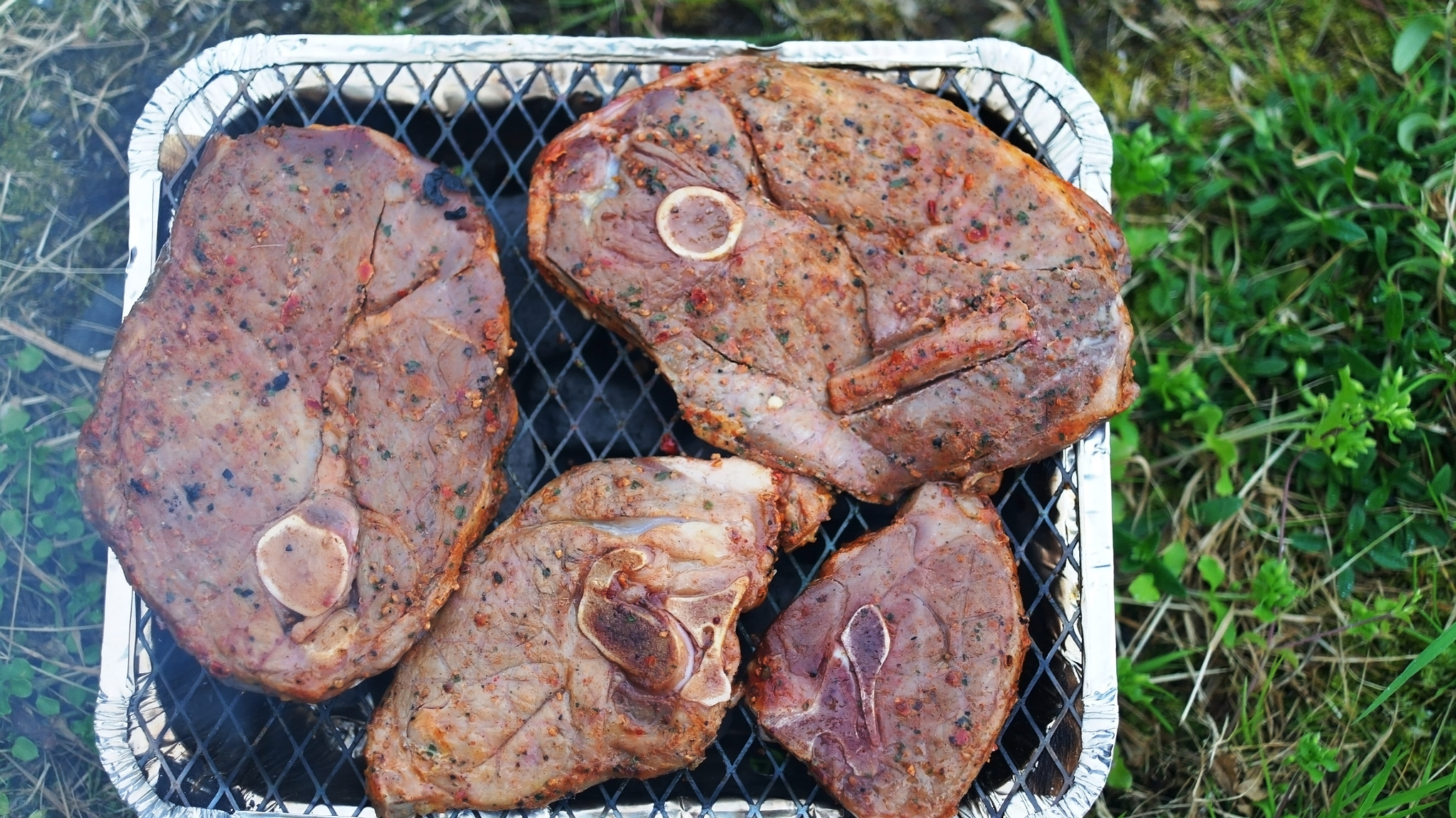 Samsung NX11 sample photo. Lamb steaks on disposable grill photography