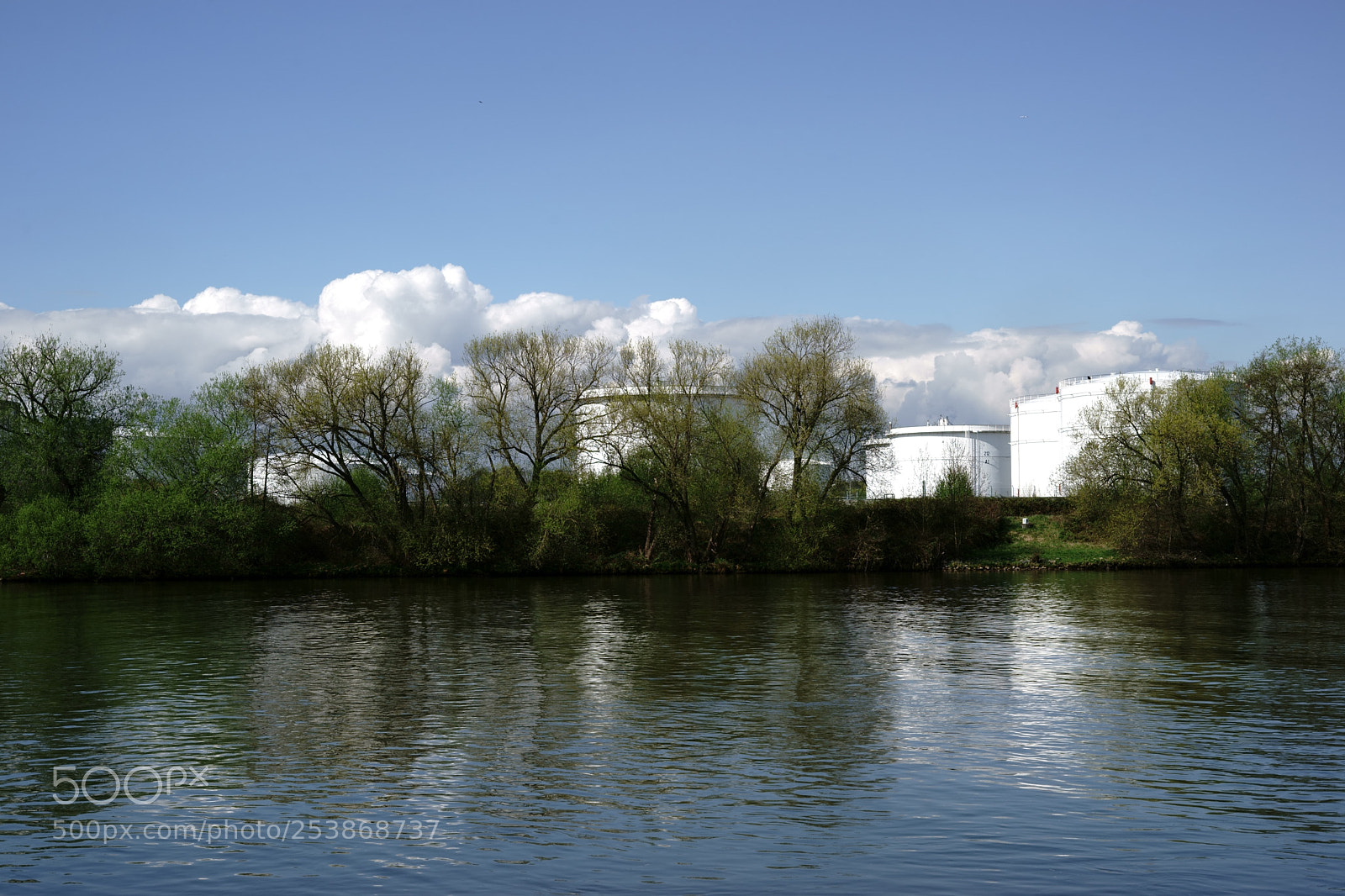 Sony a7 II sample photo. Storage tanks behind the photography
