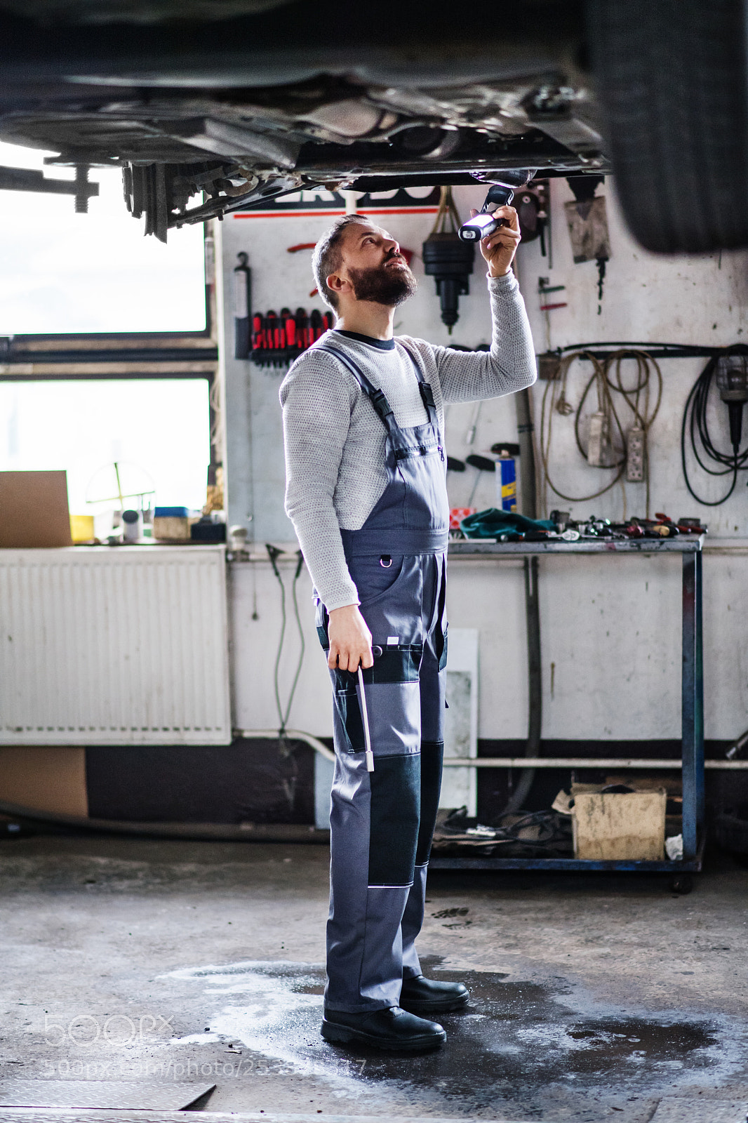 Nikon D5 sample photo. Man mechanic repairing a photography