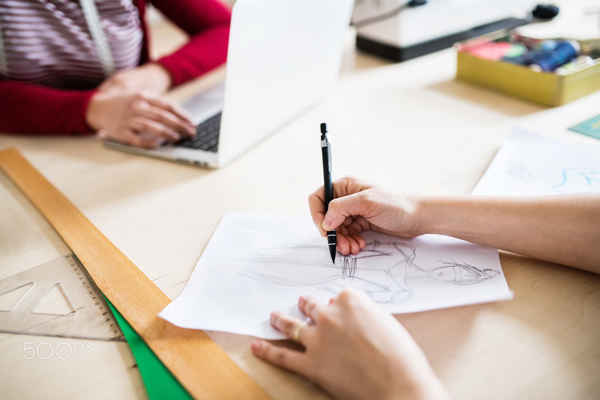 Young creative women in a studio, startup business.