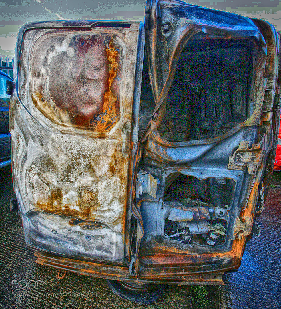 Canon EOS 400D (EOS Digital Rebel XTi / EOS Kiss Digital X) sample photo. Burnt out doors photography