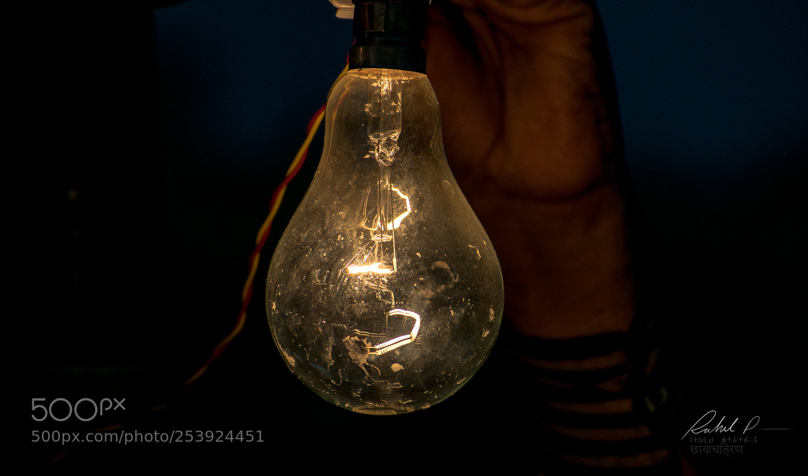 Nikon D3400 sample photo. Shopkeeper removing darkness photography