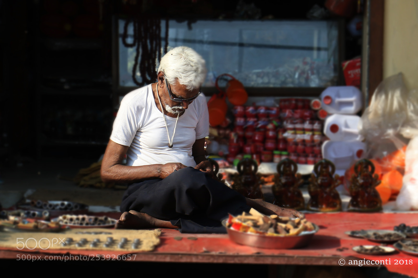 Canon EOS 7D Mark II sample photo. Shopkeeper photography