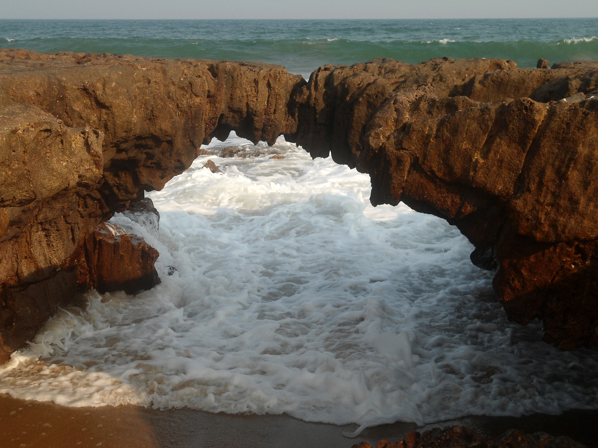 Sony Cyber-shot DSC-W510 sample photo. Natural arch (water eroded) at thotlakonda beach photography
