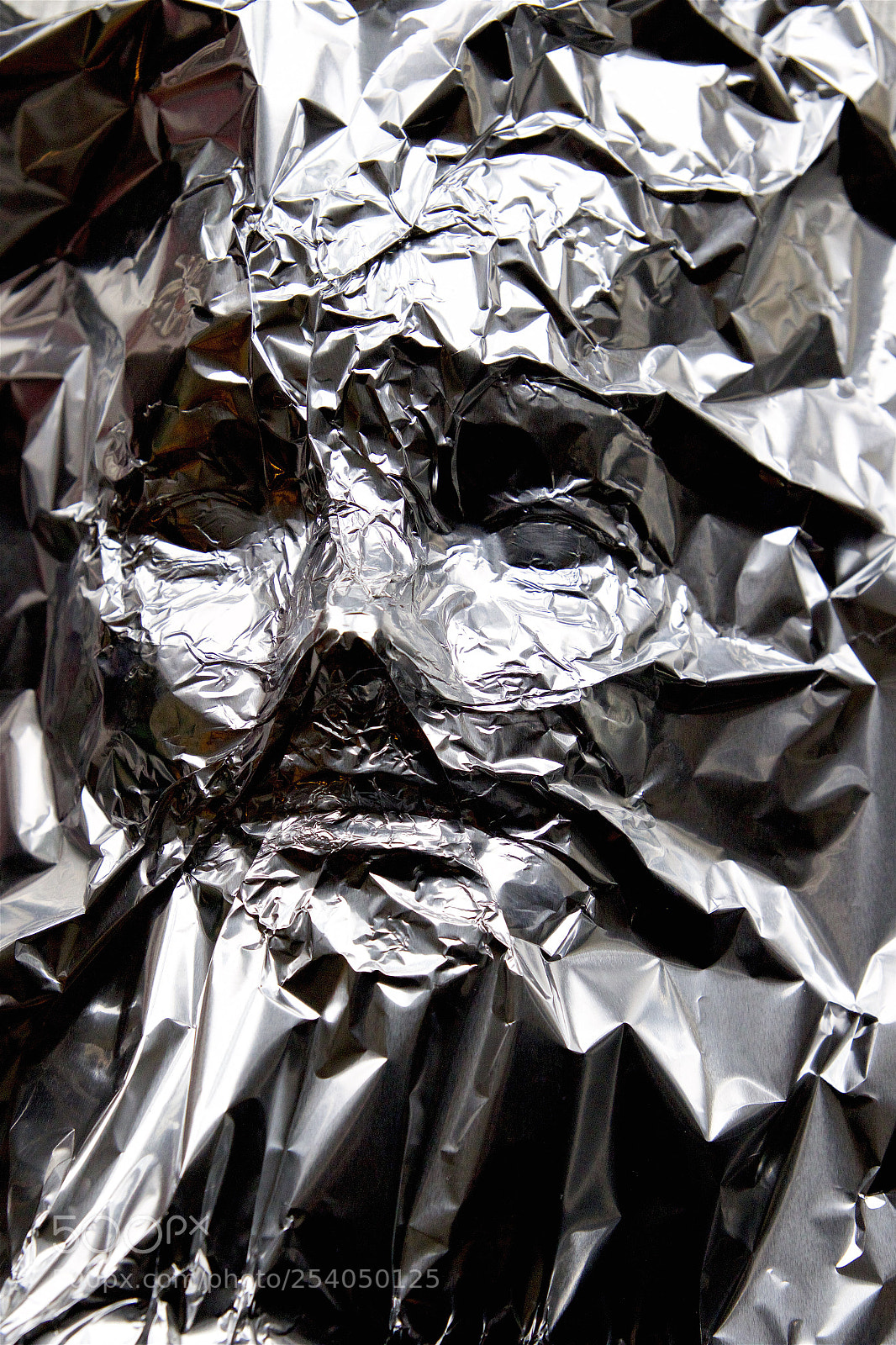 Canon EOS 7D Mark II sample photo. A tinfoil pressing photography