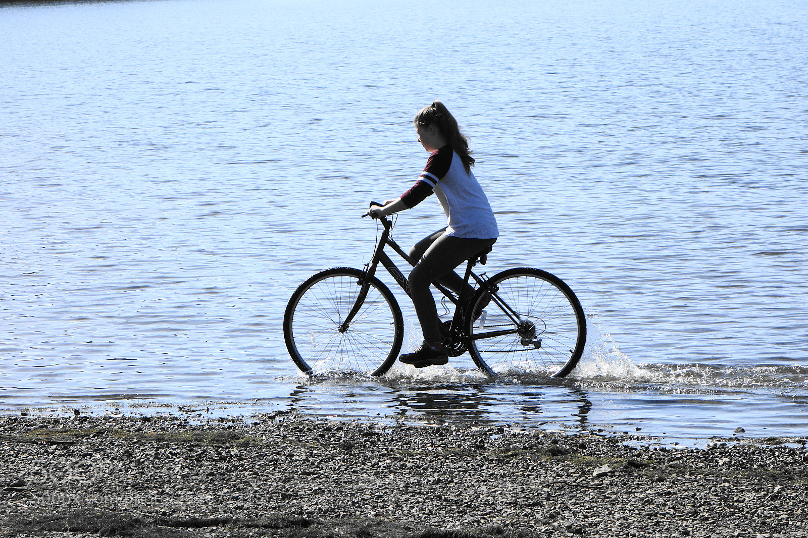 Sony Cyber-shot DSC-RX100 sample photo. Girl on bike on photography