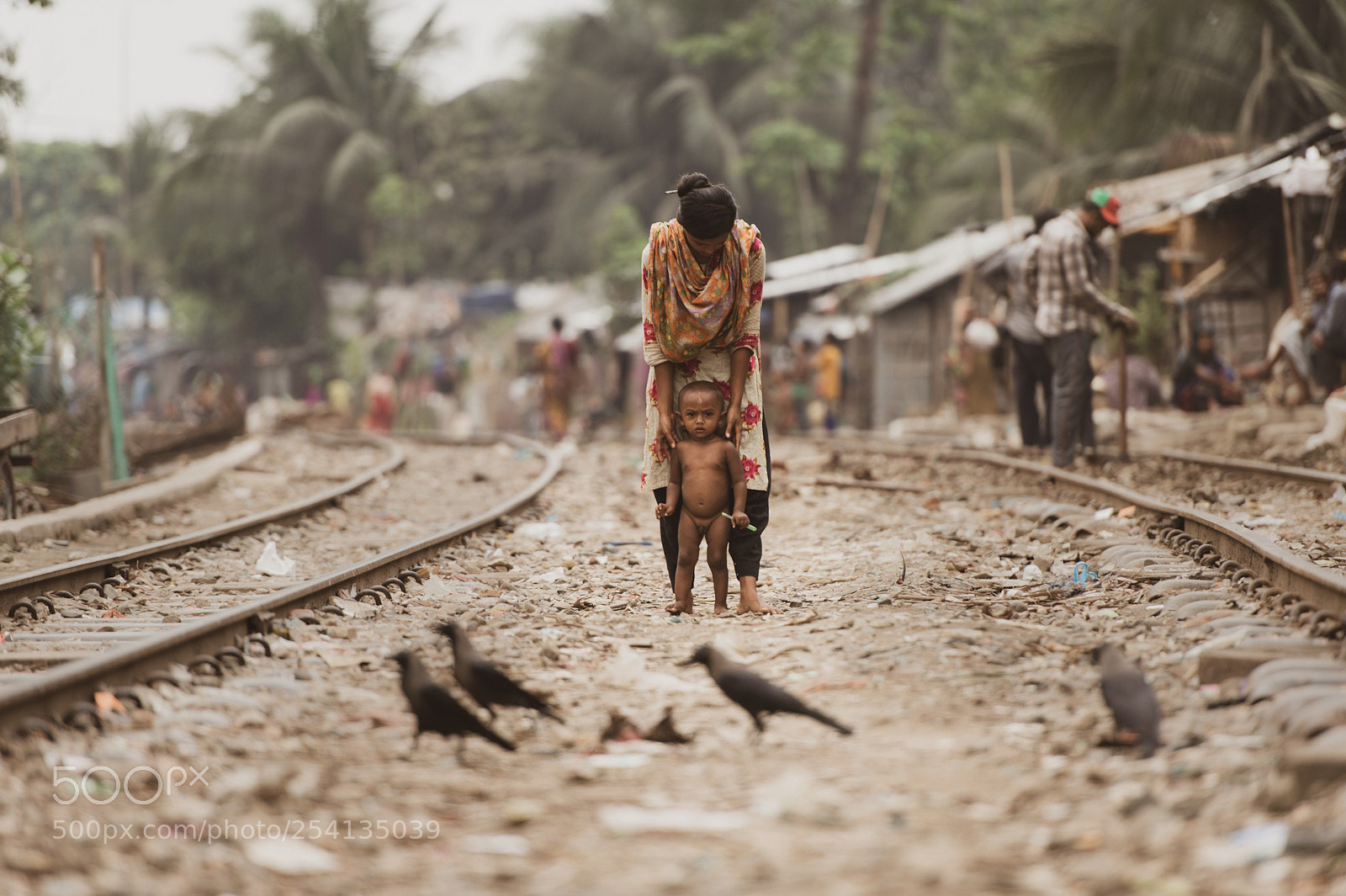 Nikon D4 sample photo. Boy between railway tracks photography