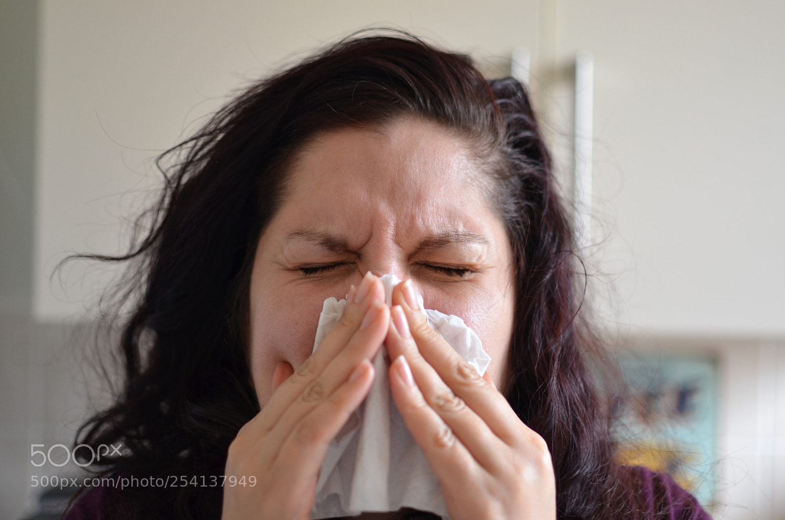 Nikon D7000 sample photo. Woman blowing her nose photography