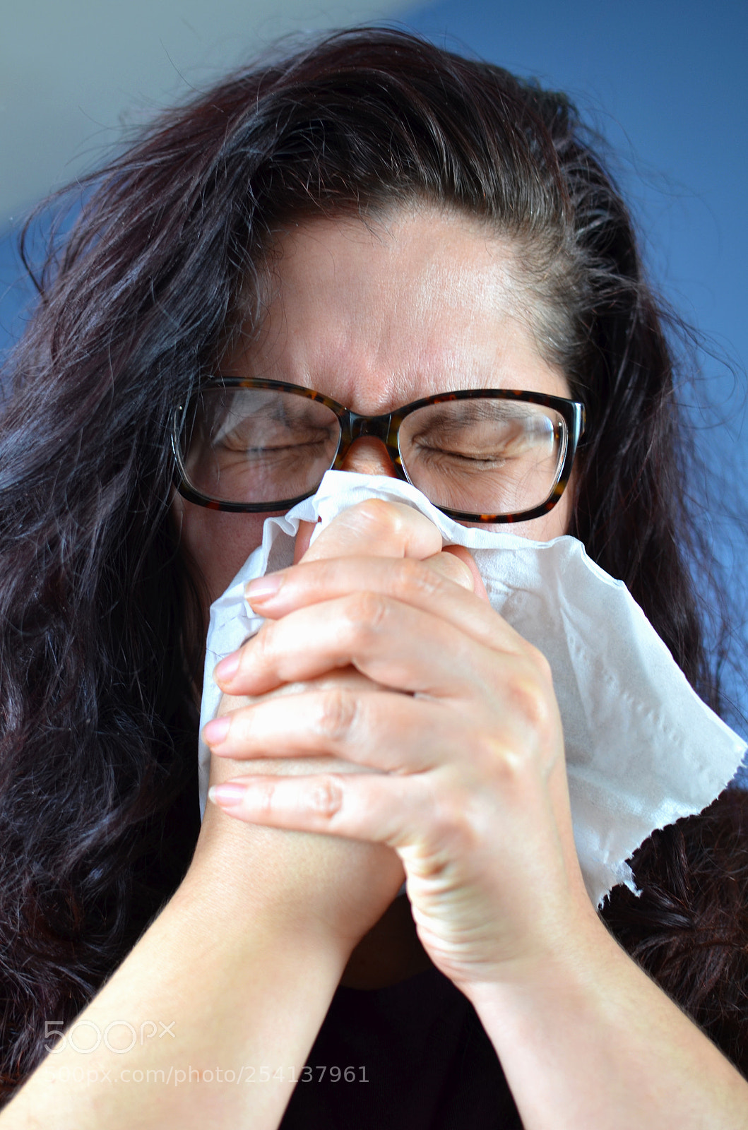 Nikon D7000 sample photo. Woman blowing her nose photography