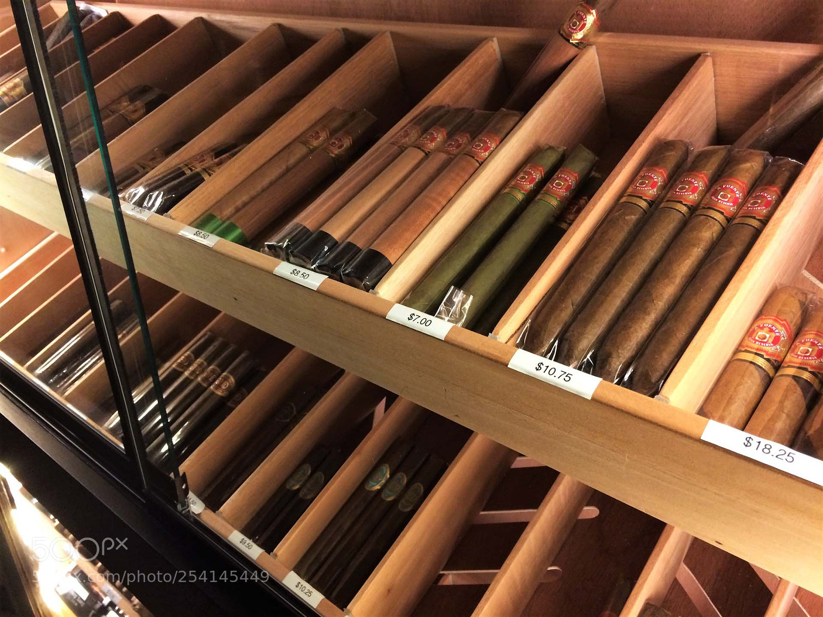 Apple iPhone 5s sample photo. Cigar liability insurance in photography