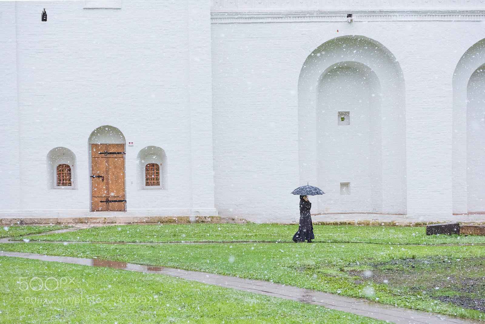 Nikon D810 sample photo. A nun walking in photography
