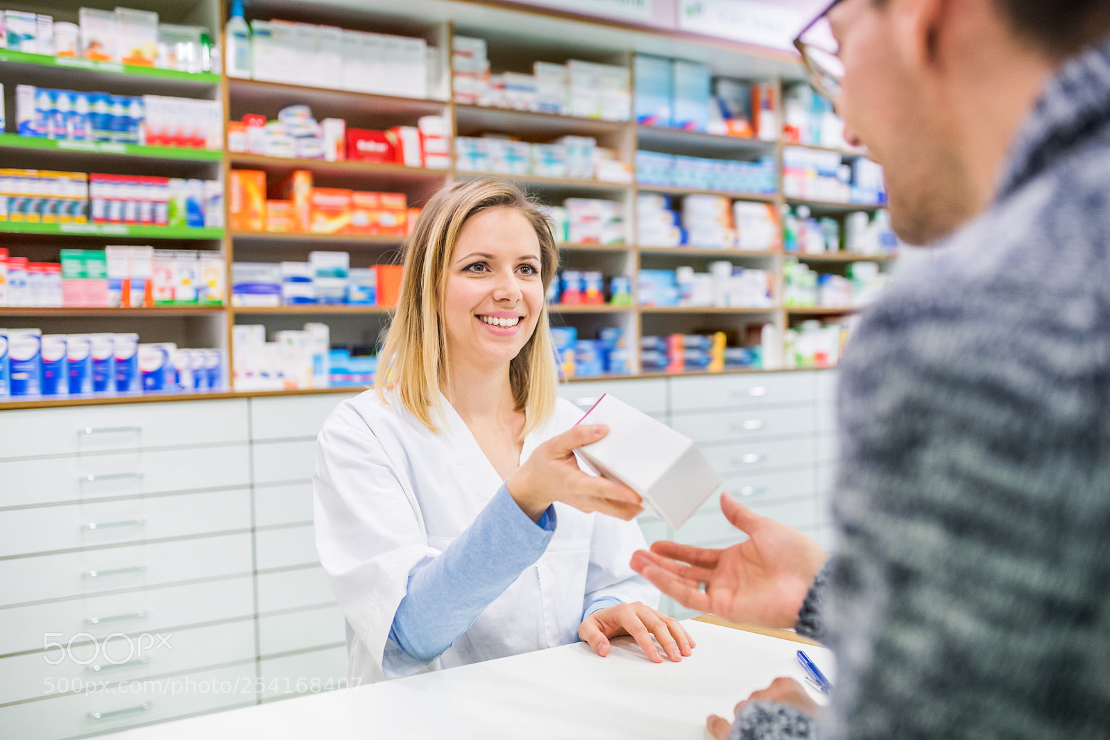 Nikon D5 sample photo. Female pharmacist serving a photography