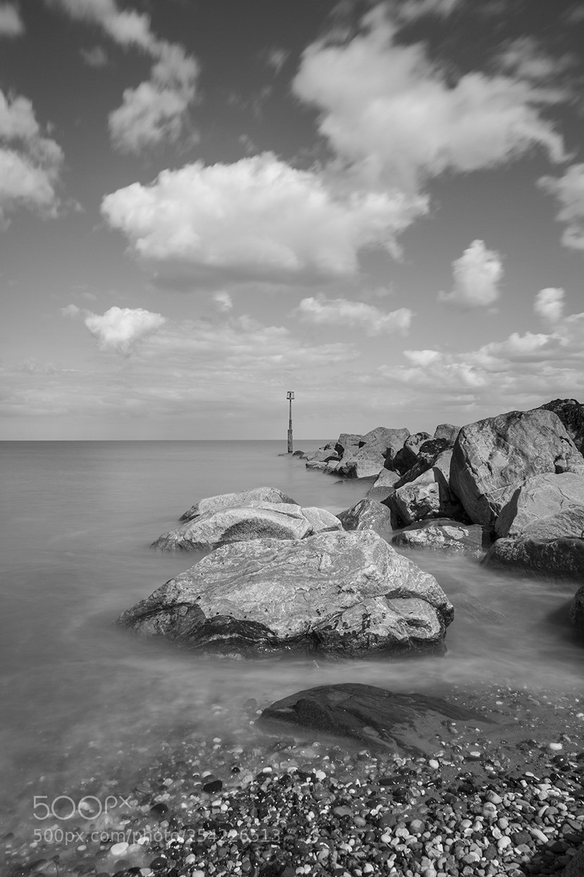 Canon EOS 7D sample photo. Rocks and clouds bw photography