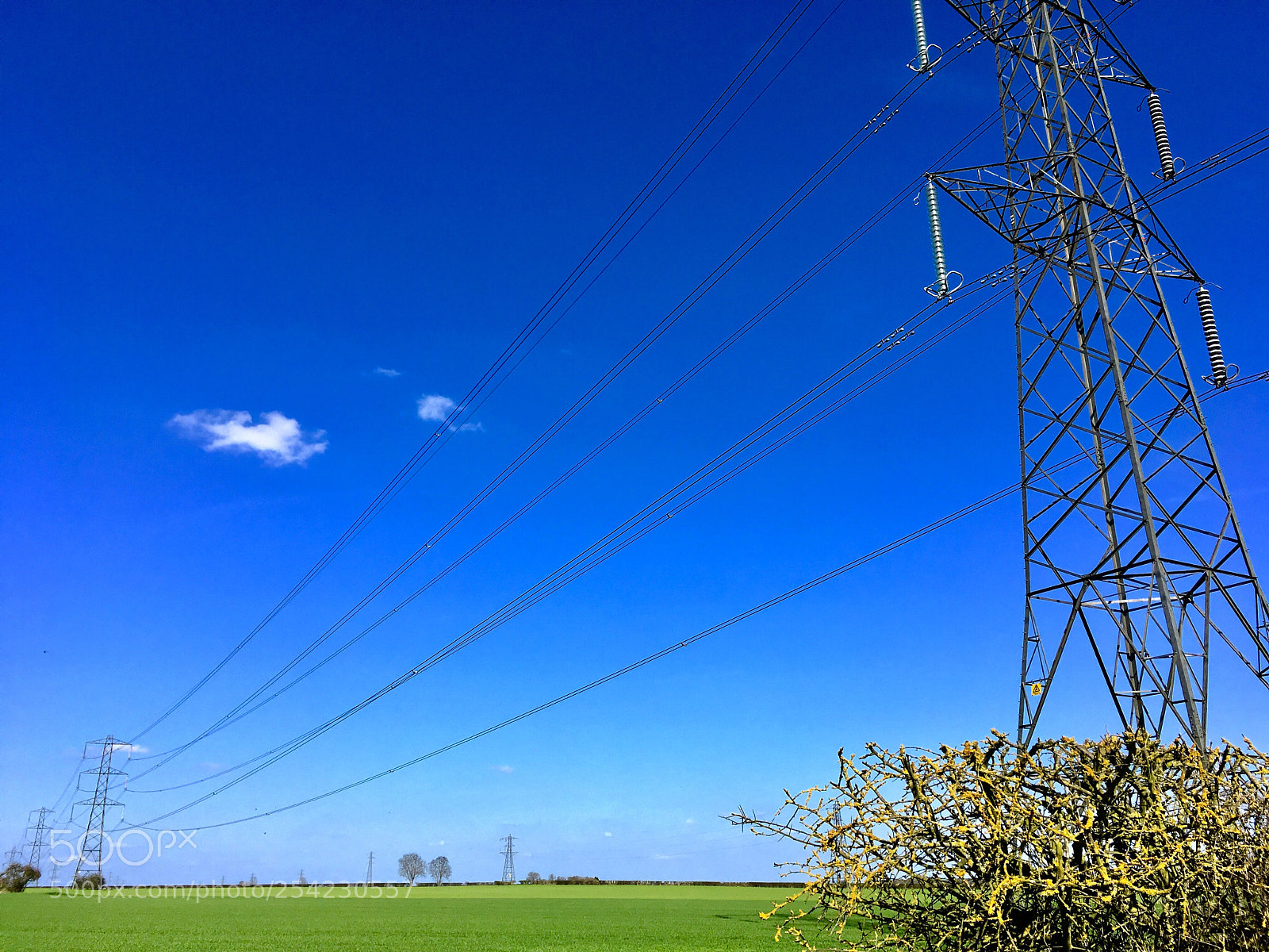 Apple iPhone SE sample photo. Pylons and blue skies photography