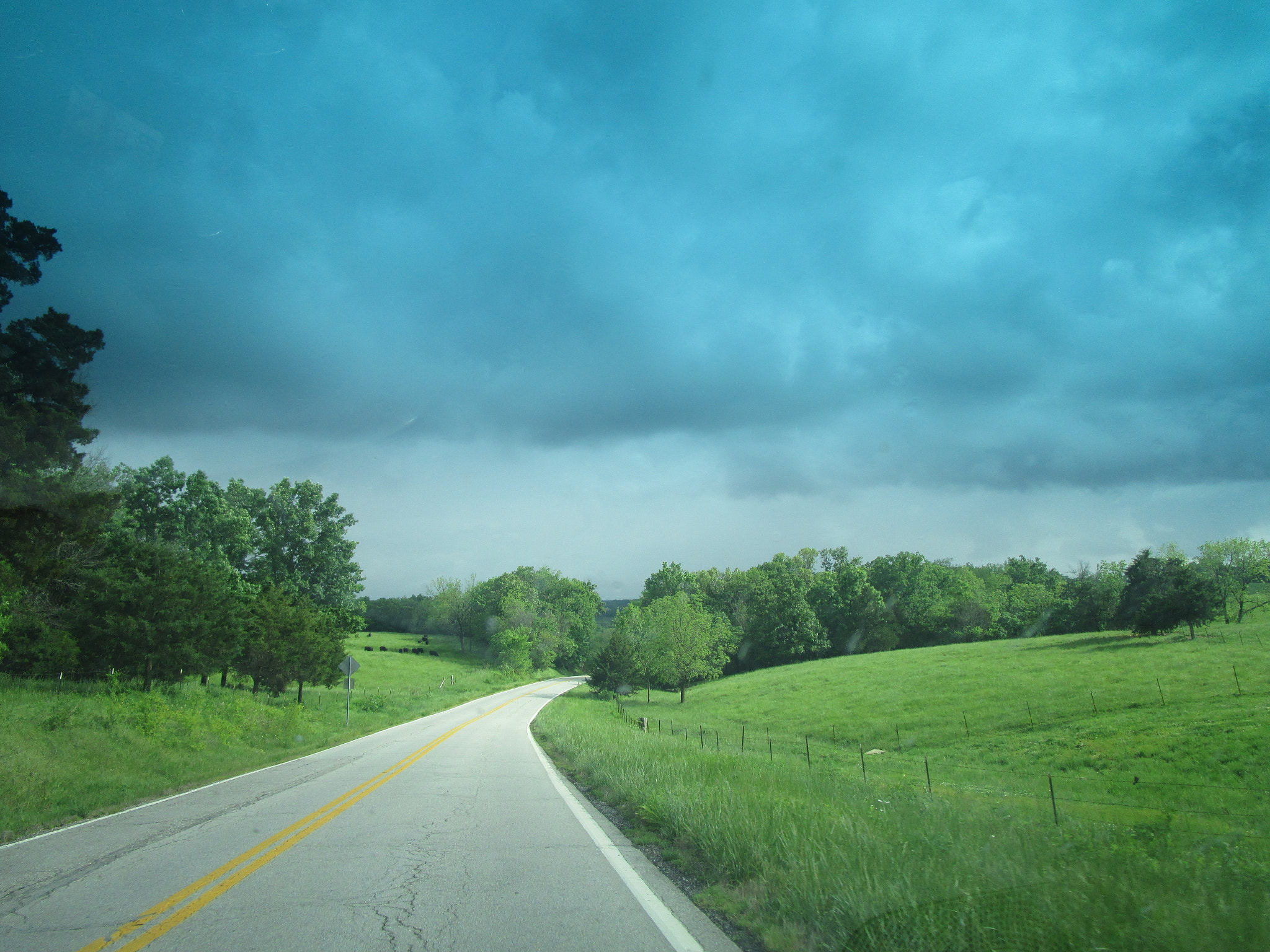 Canon PowerShot ELPH 150 IS (IXUS 155 / IXY 140) sample photo. Stormy road photography