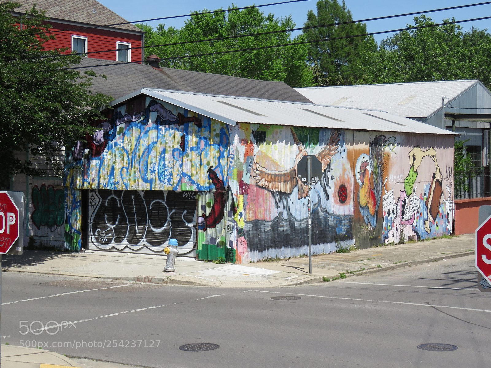 Canon PowerShot SX60 HS sample photo. Multicolor painted building in photography