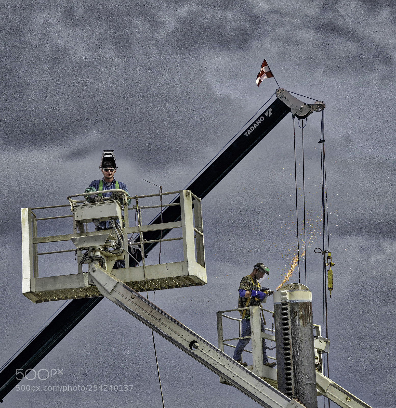 Canon PowerShot SX60 HS sample photo. Men at work photography