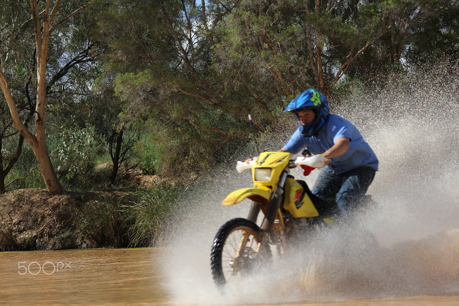 Canon EF-S 55-250mm F4-5.6 IS sample photo. Bike on water photography