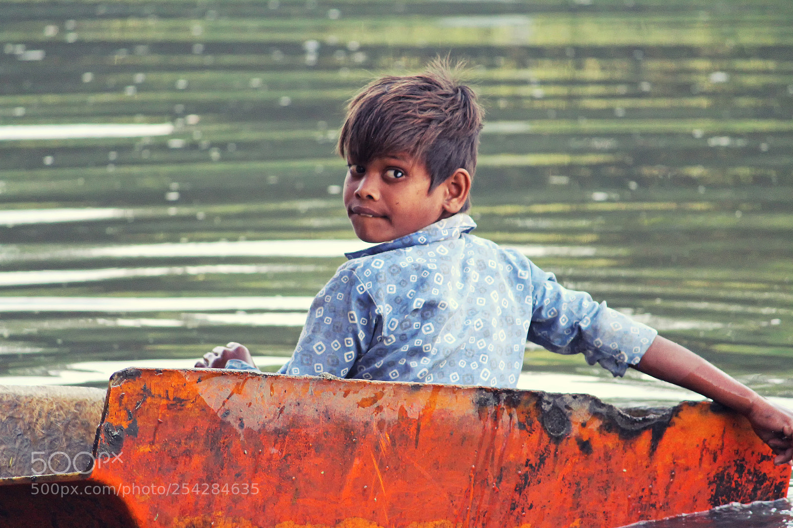 Canon EOS 700D (EOS Rebel T5i / EOS Kiss X7i) sample photo. Boy in boat photography