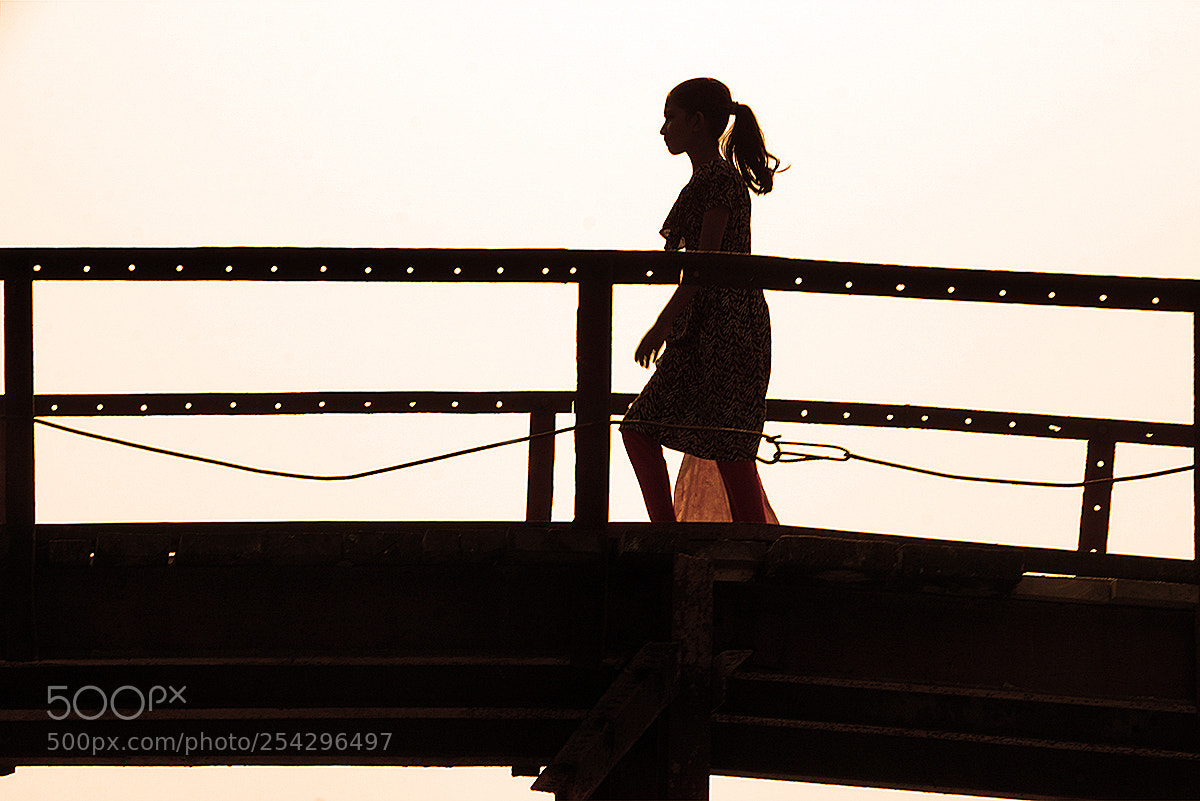 Sony a6000 sample photo. Modern girl crossing a photography