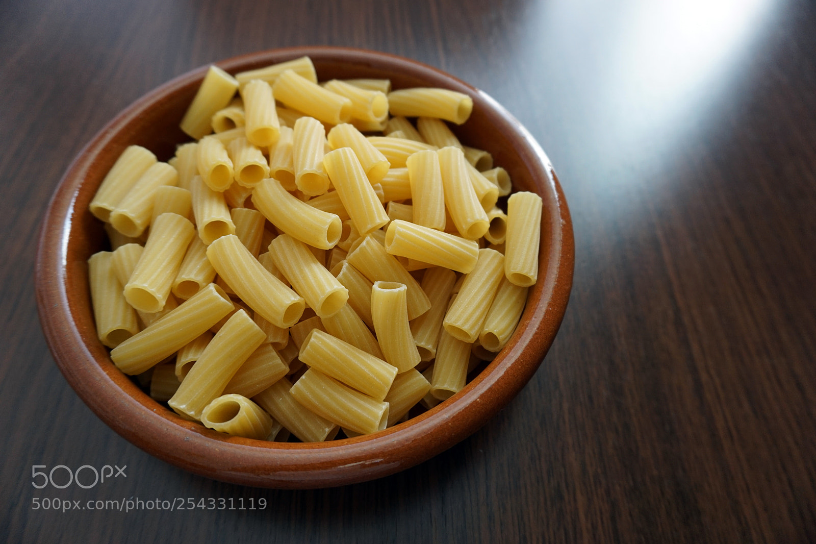 Sony a5100 sample photo. Round clay bowl filled photography