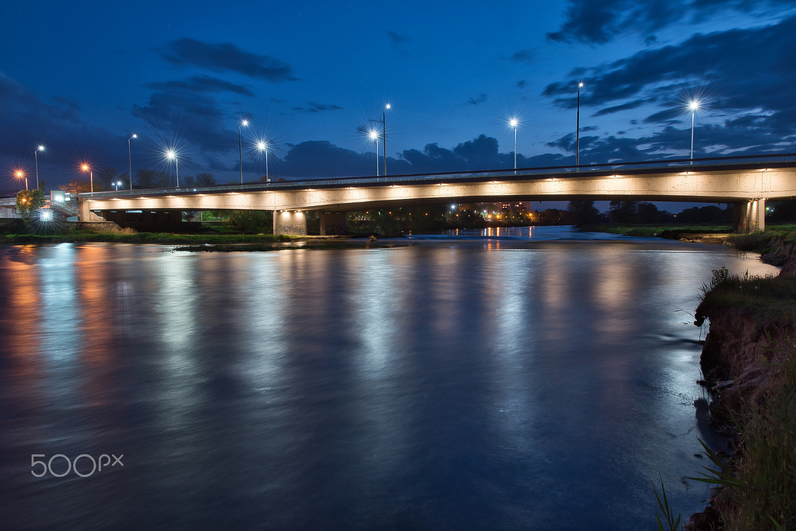 Nikon D5600 sample photo. A night view of a bridge over a river photography