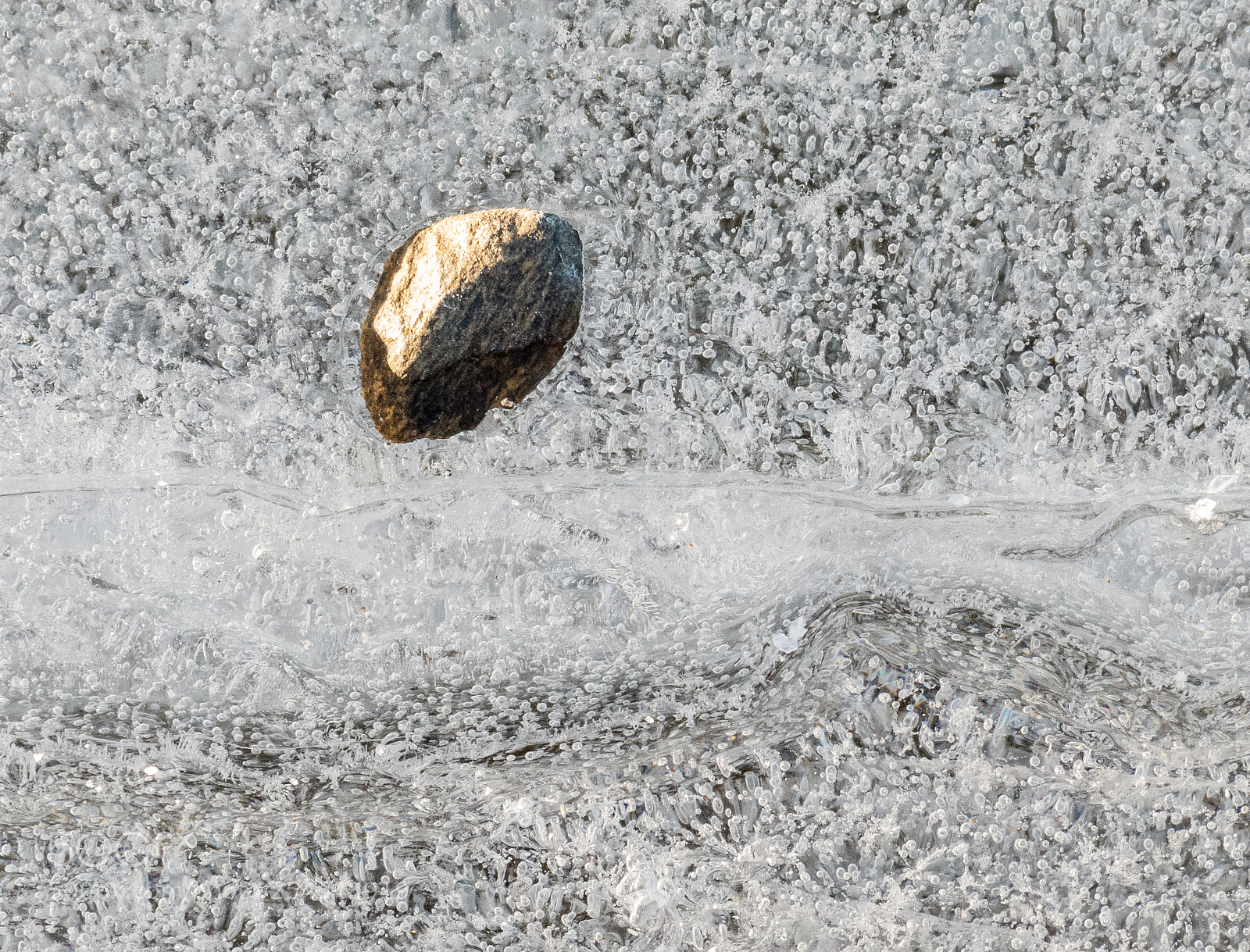Canon PowerShot G16 sample photo. Stone on ice photography