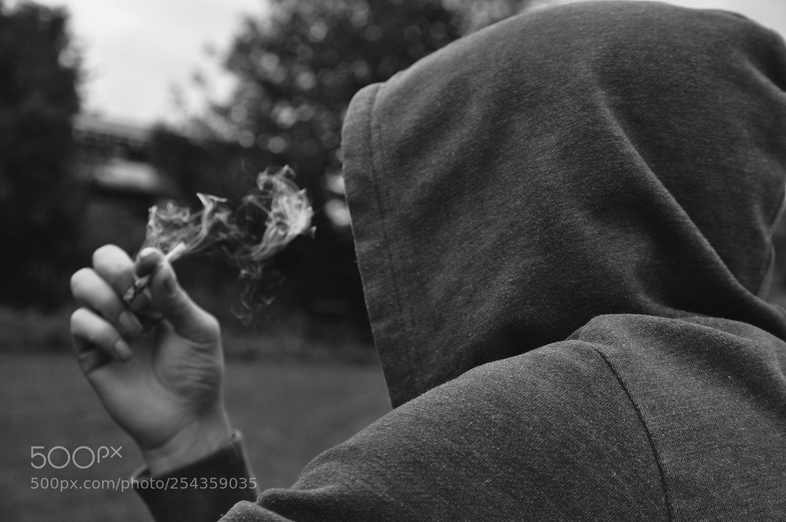 Nikon D5000 sample photo. Mysterious faceless person smoking photography