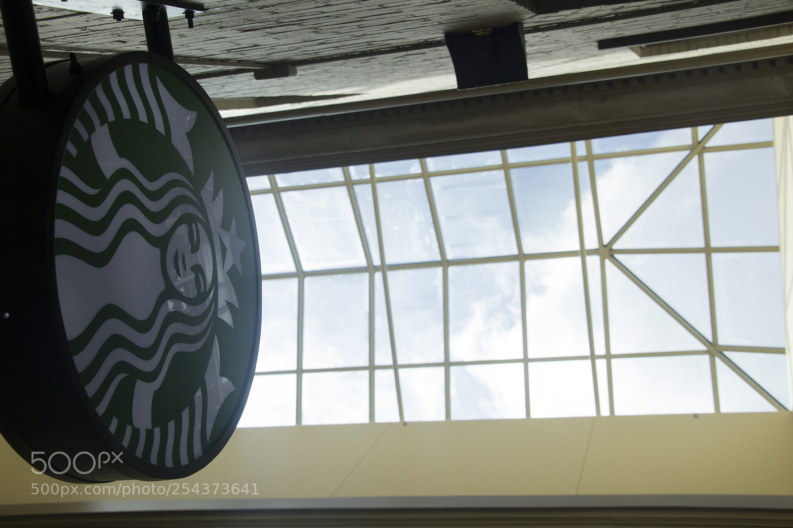 Canon EOS 1200D (EOS Rebel T5 / EOS Kiss X70 / EOS Hi) sample photo. Sunlight above starbucks. photography