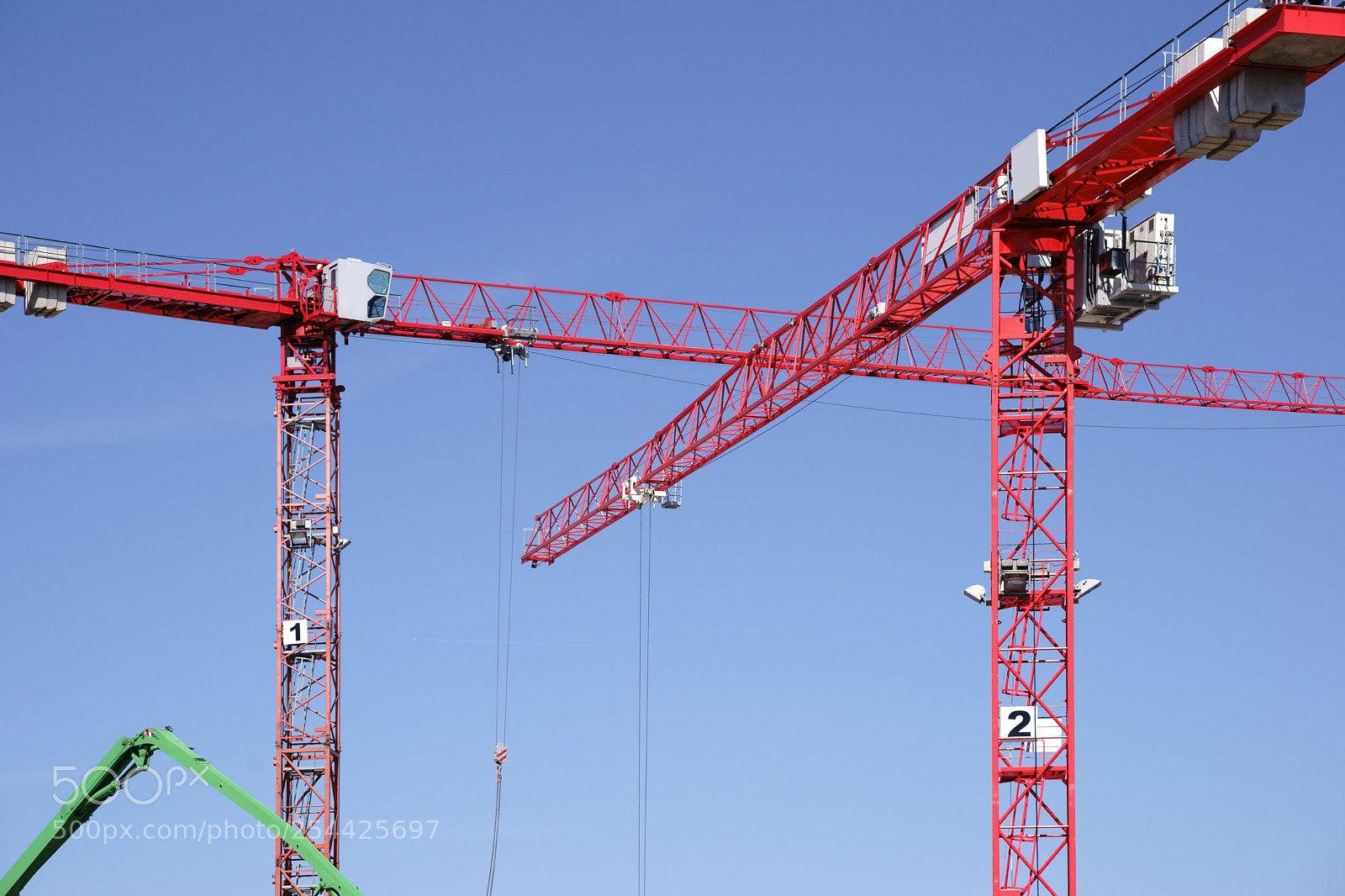 Sony a7 II sample photo. Red construction cranes in photography