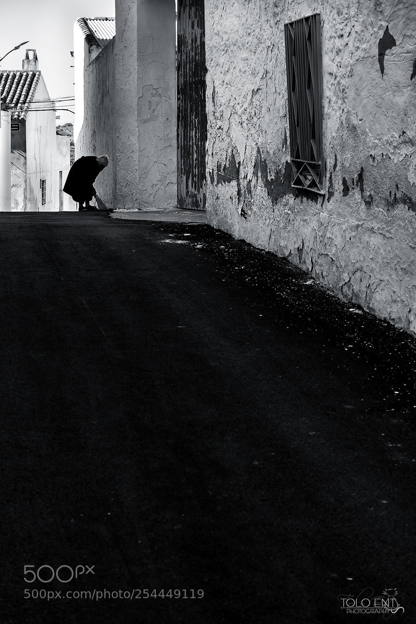 Olympus OM-D E-M1 sample photo. Cleaning the street. photography