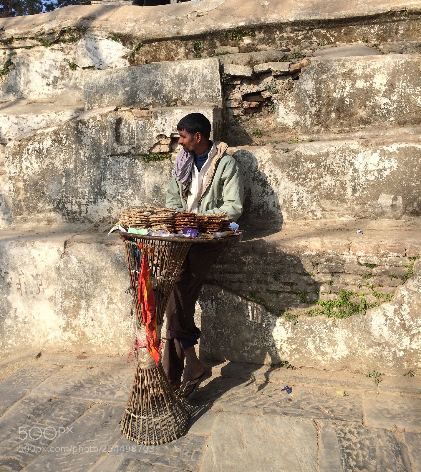 Apple iPhone 5s sample photo. Street vendor waiting for photography