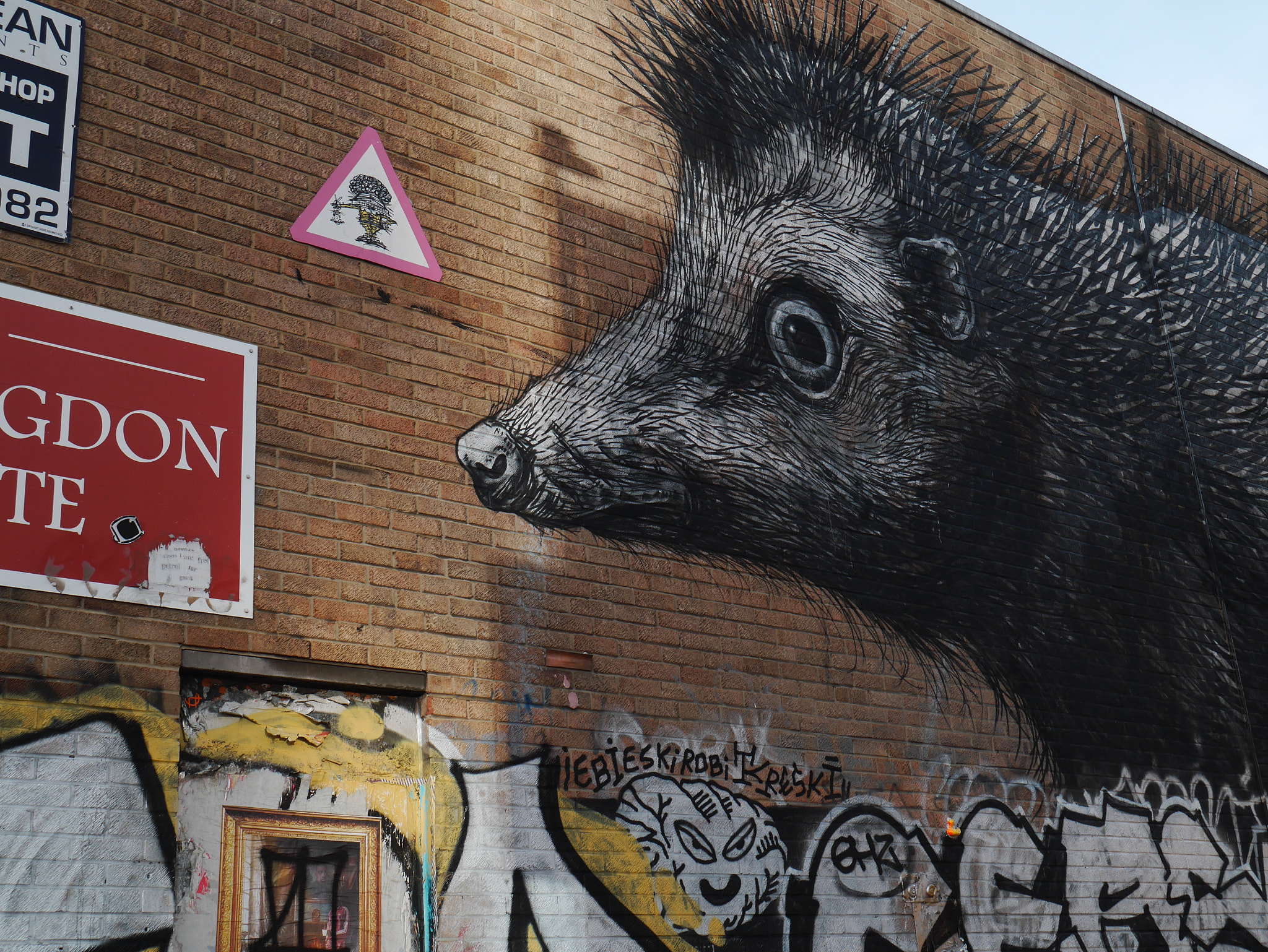Panasonic Lumix DMC-GF6 sample photo. An hedgehog in bricklane photography