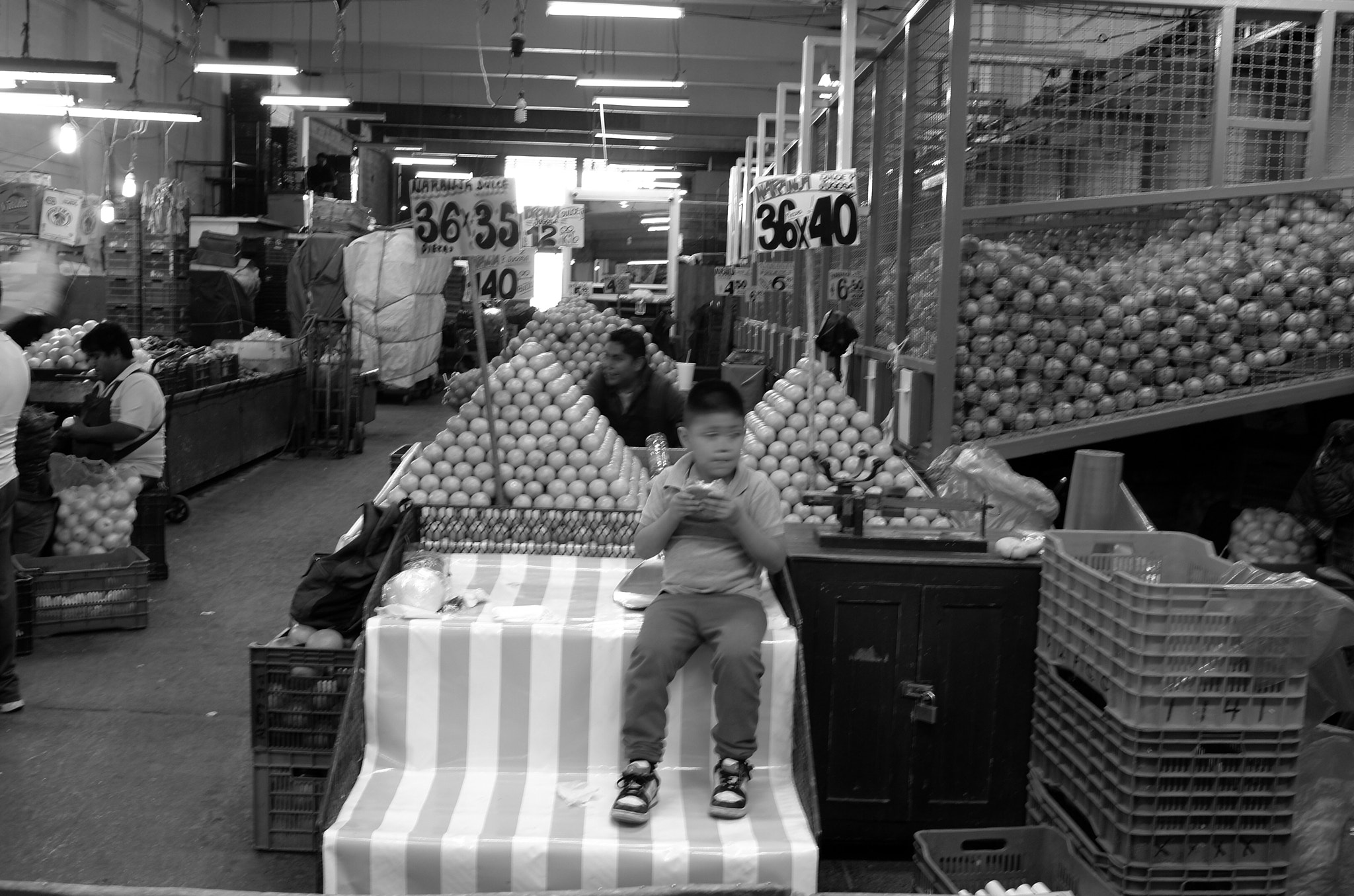 Leica X2 sample photo. Child in the market photography