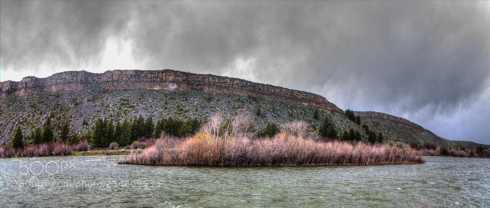 Canon EOS 60D sample photo. Rain along a river photography