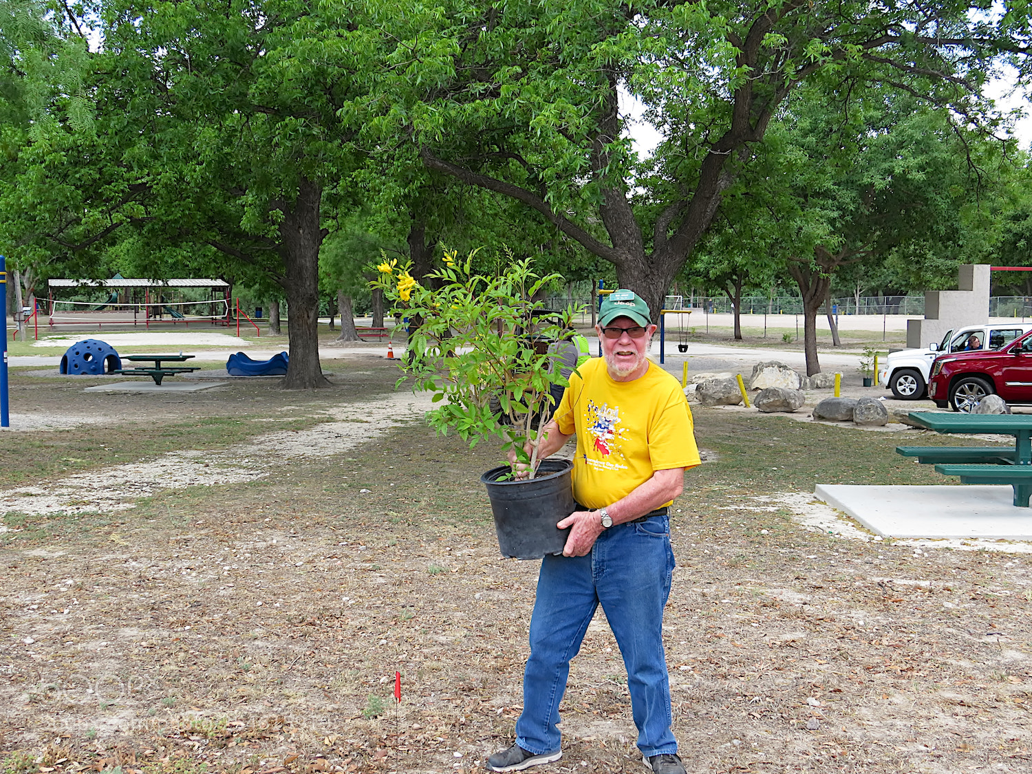 Canon PowerShot SX50 HS sample photo. Earth day planting photography