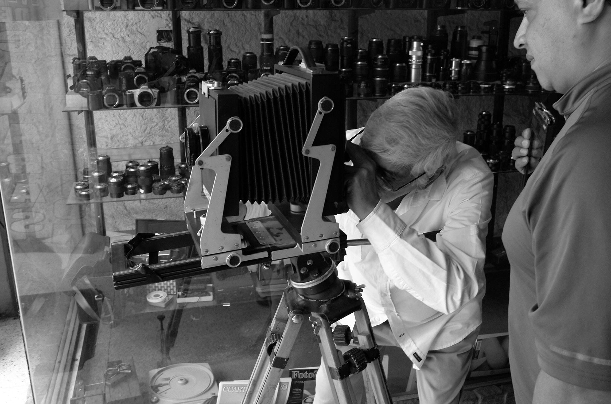 Leica X2 sample photo. Focusing a vintage large format camera photography