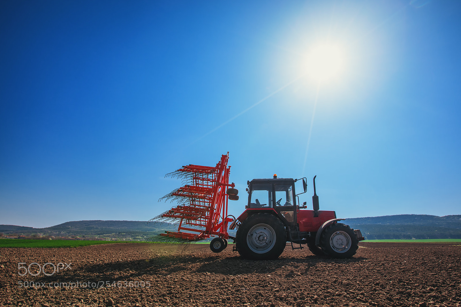 Canon EOS 5D Mark IV sample photo. Farmer with tractor seeding photography