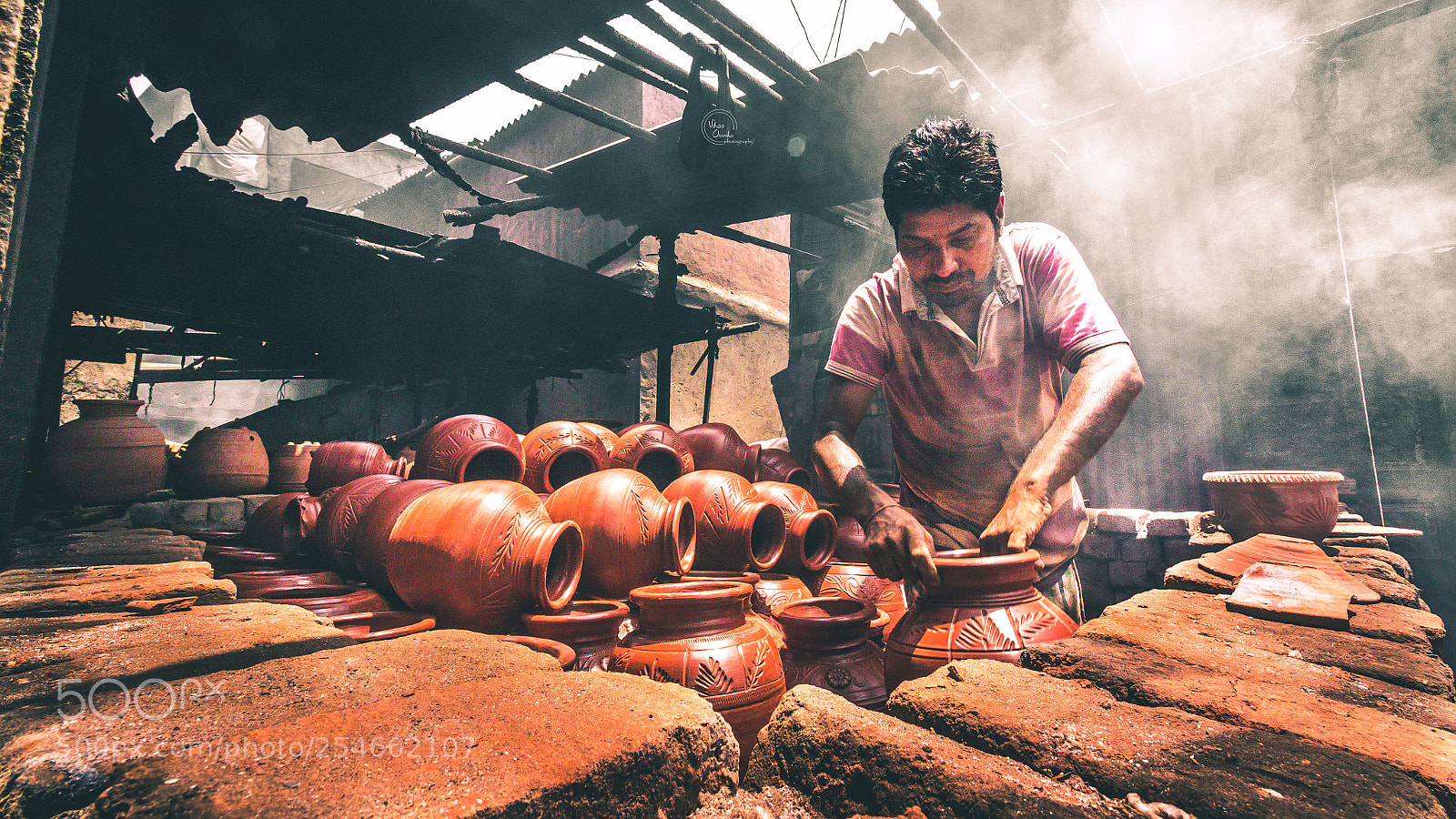 Canon EOS 70D sample photo. Baking his pots.. photography