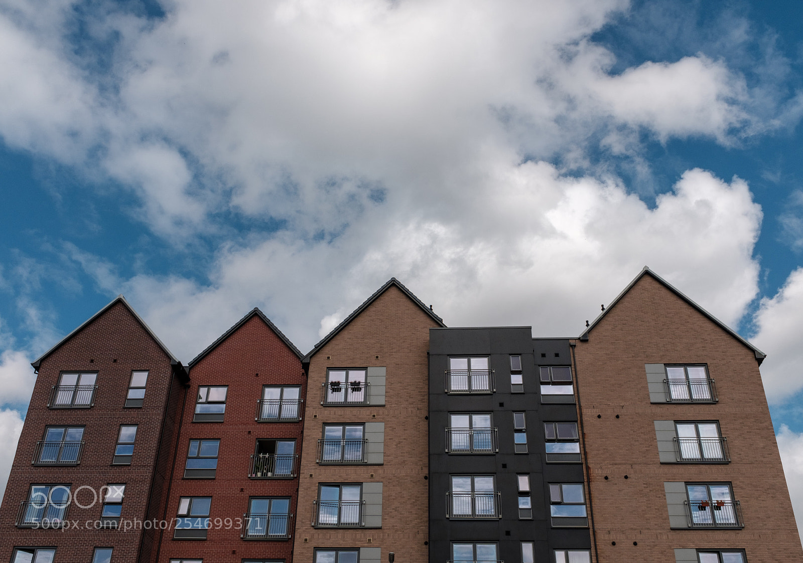 Fujifilm X100F sample photo. Sky and pointy houses photography