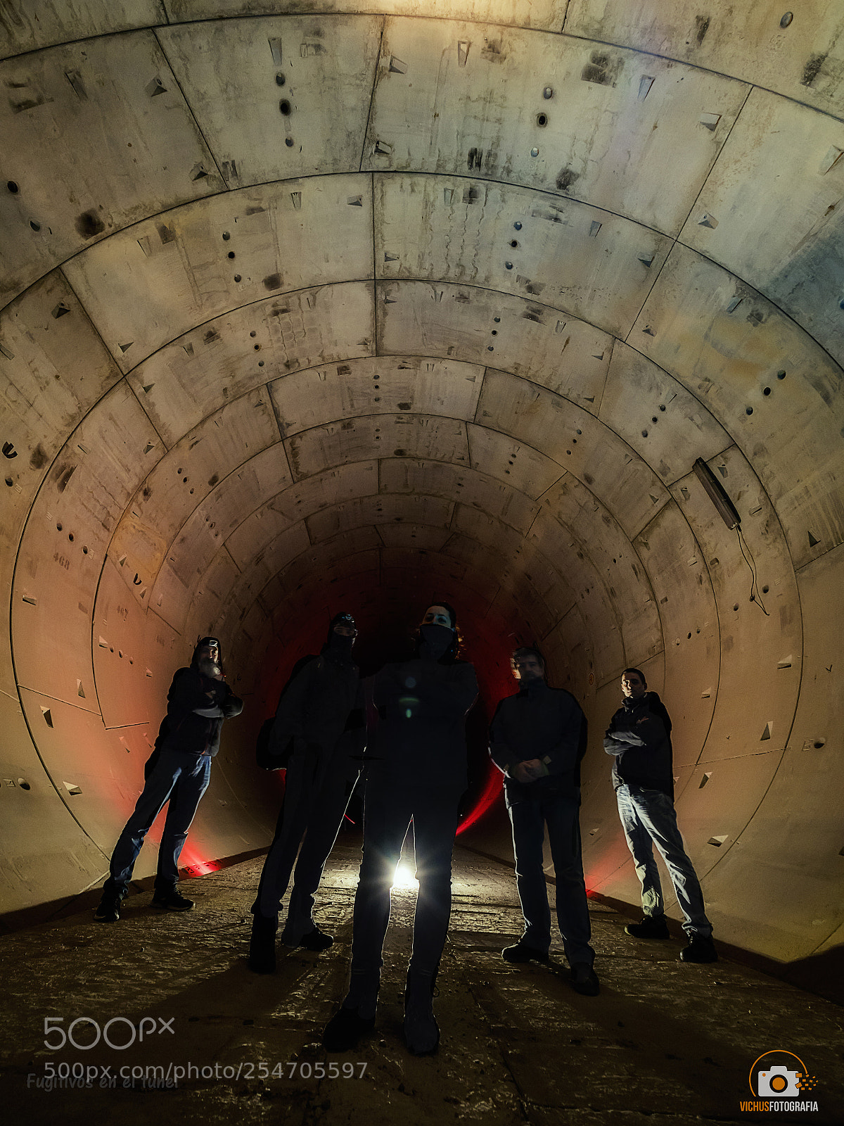 Olympus OM-D E-M1 Mark II sample photo. Fugitives in the tunnel photography