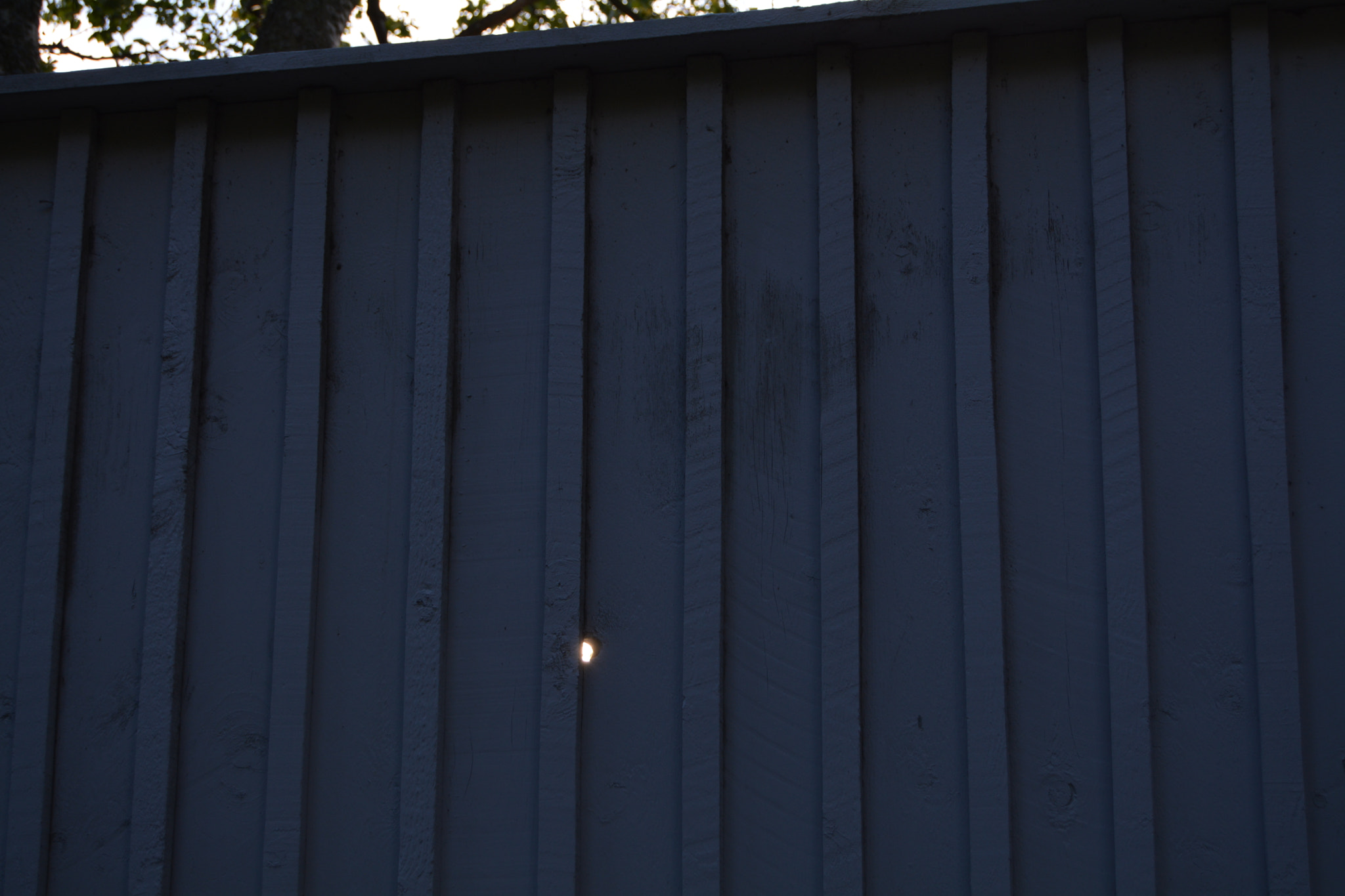 Nikon D5200 sample photo. A hold in the wall of a nudist beach photography