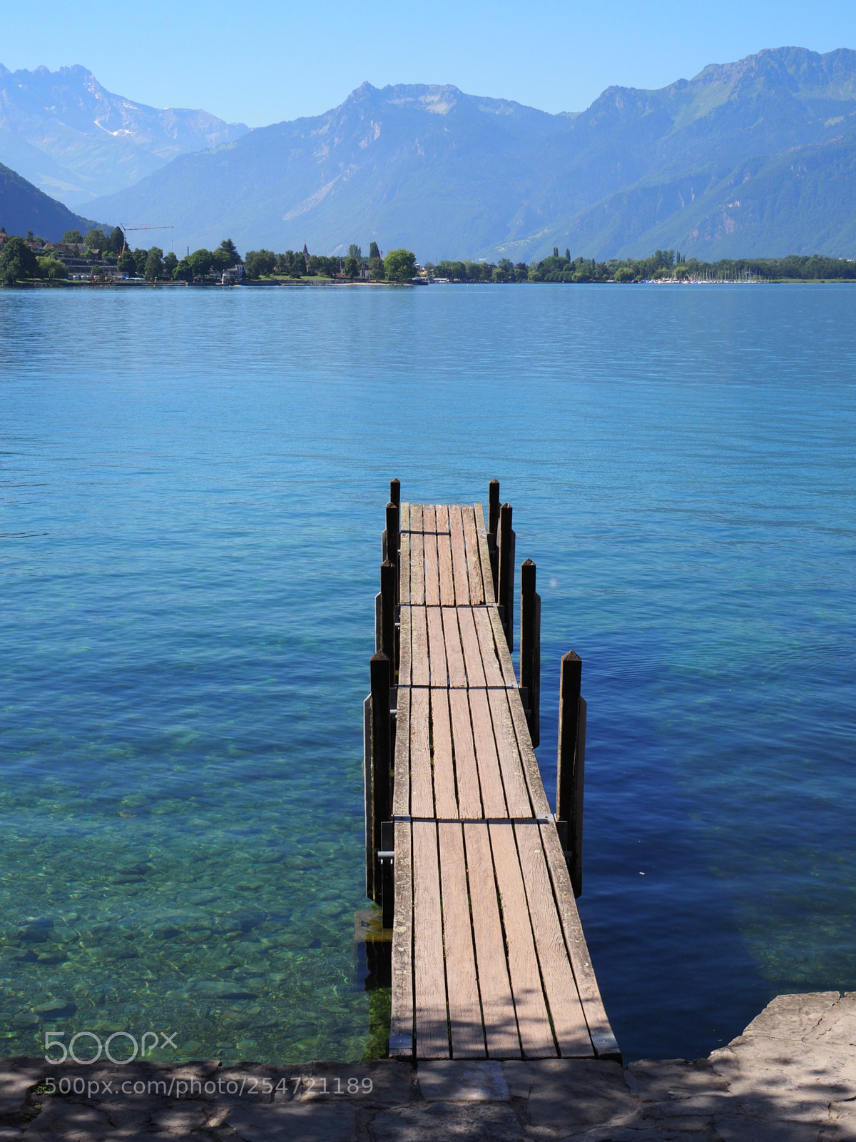 Olympus OM-D E-M1 Mark II sample photo. Wooden jetty on lake photography