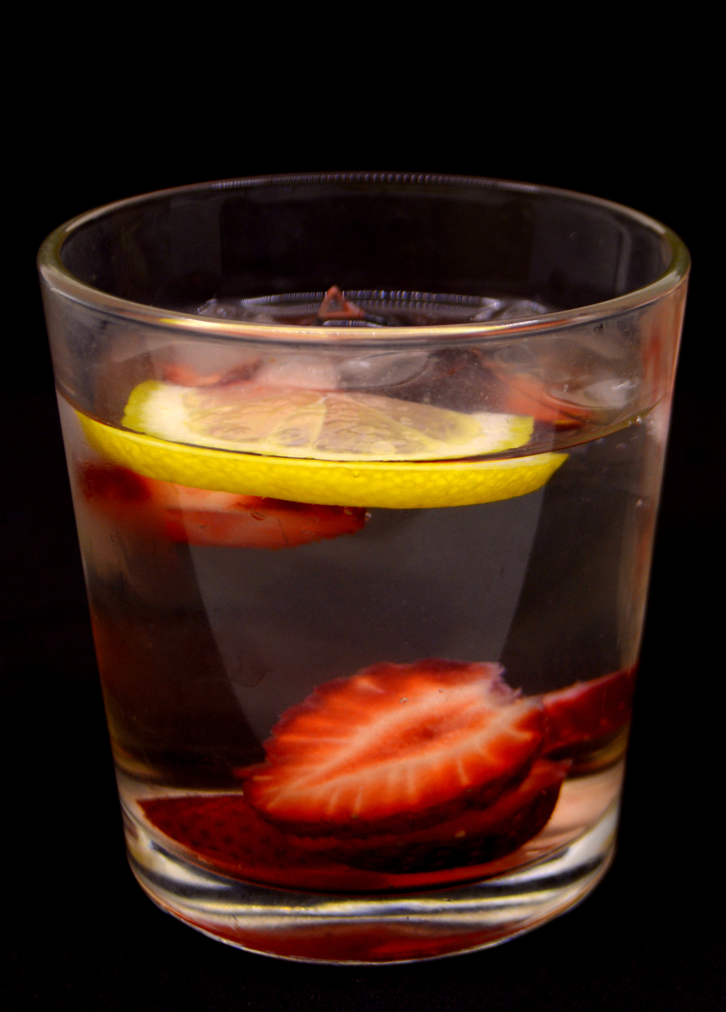 Nikon D7100 sample photo. Lemonade with strawberries on black background photography