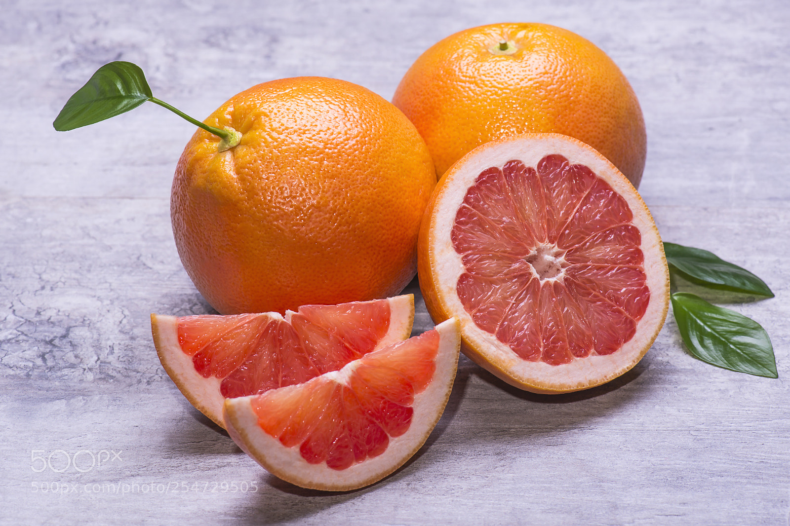 Nikon D610 sample photo. Grapefruit whole, half and photography